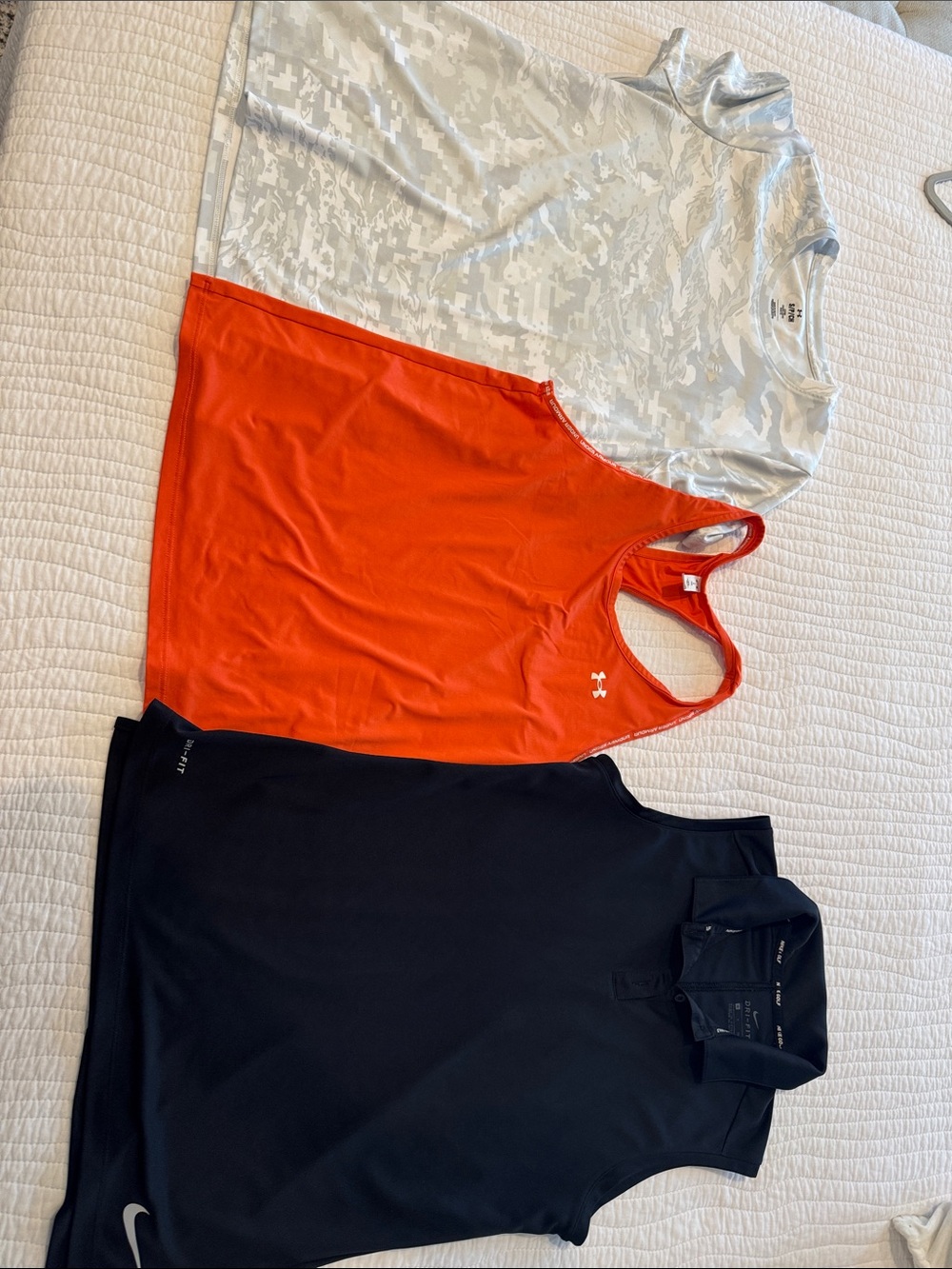3 active tops - Under Armour (2) and Nike (1)